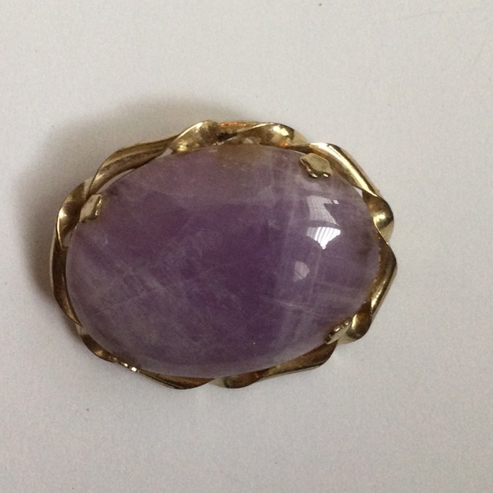 Pale purple stone brooch